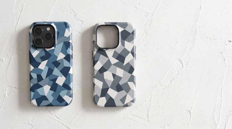 Navy-Blue and White Camouflage iPhone tough cases on white plaster, one clearly outlined and one blending in